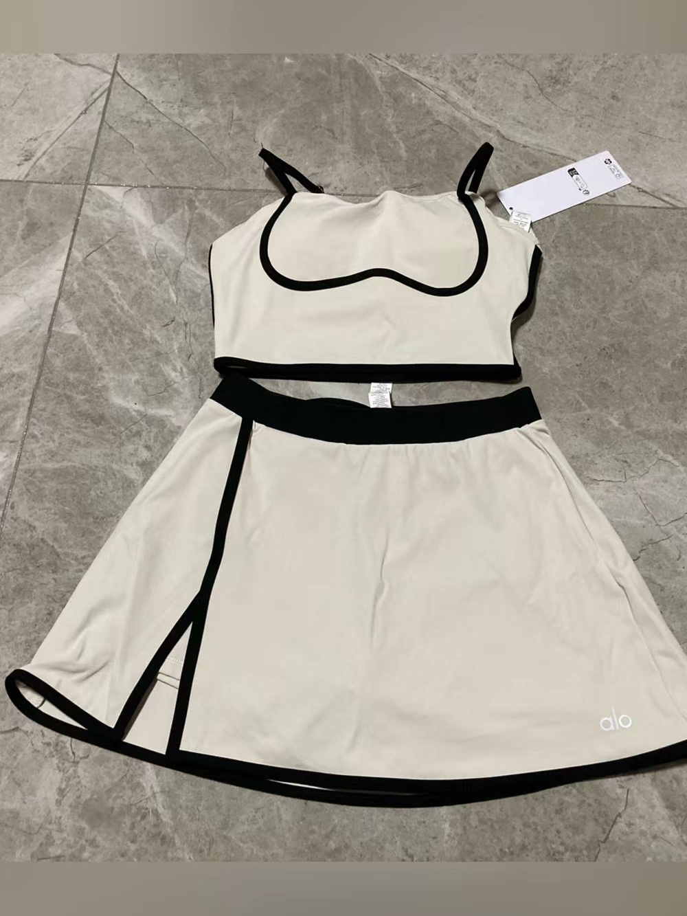 ALO Yoga Cream Crop Top & Skirt Set with Black Trim